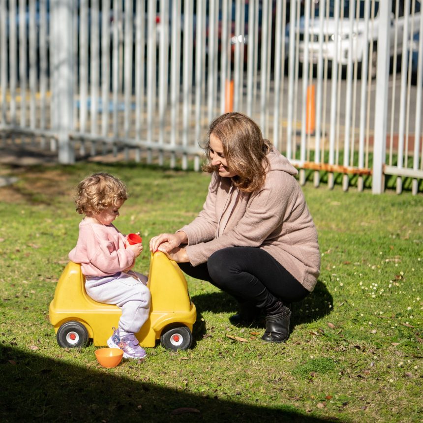 Woman and child playing