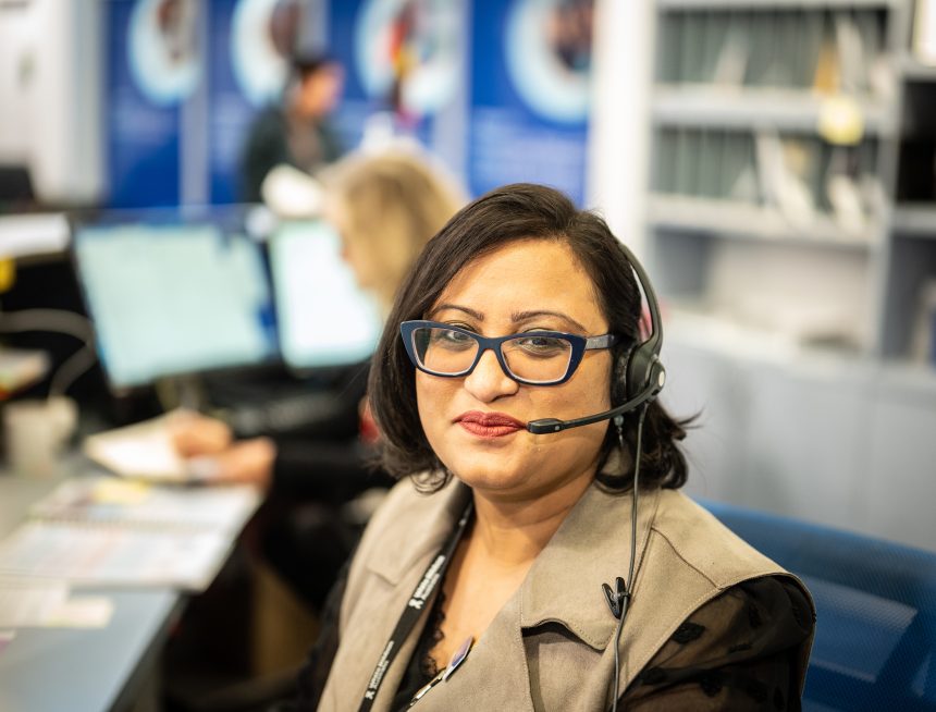 Woman smiling with headset on