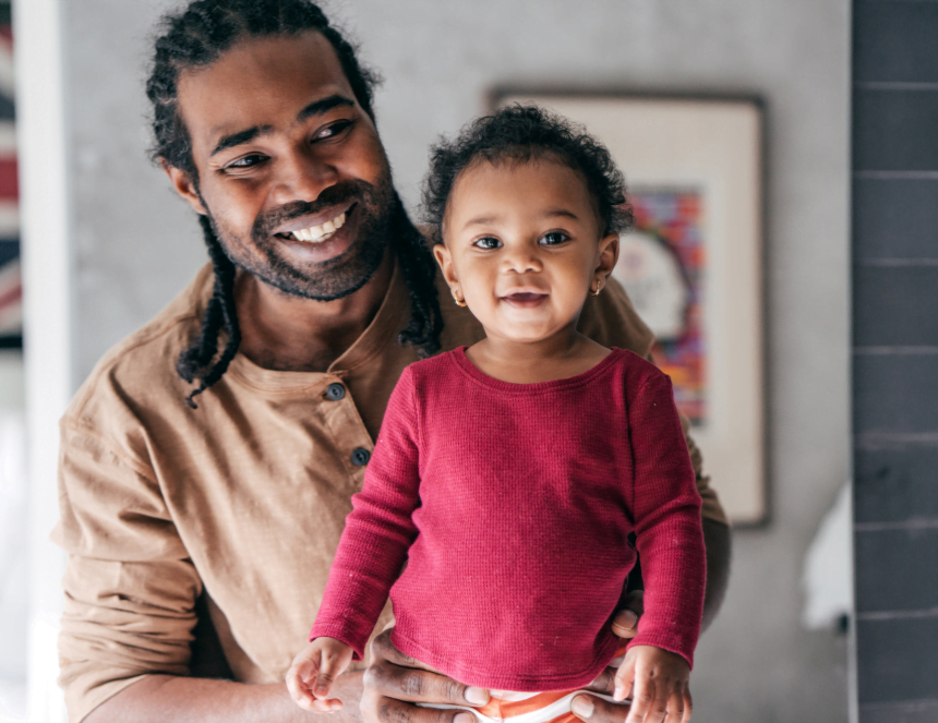 Man and child smiling